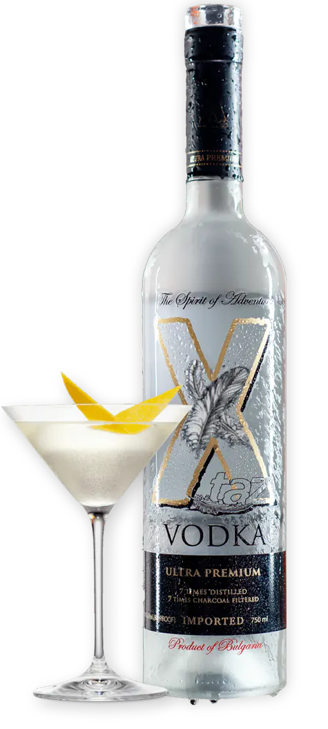 Bottle and a glass filled with vodka.