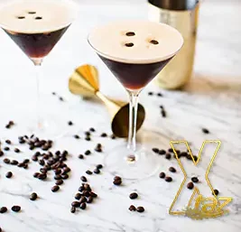 An Espresso Martini cocktail with a coffee bean on top